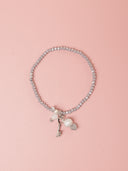Bracciale con cristallini grigi e charmes