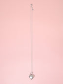 Collana lunga con perline e ciondolo maxi cuore