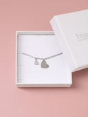Bracciale mix con ciondolo cuore e cuoricino strass