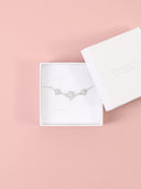 Bracciale con tre fiori sagoma di perline e strass