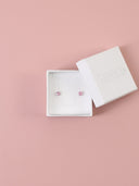 Orecchini in argento 925 con punto luce rosa
