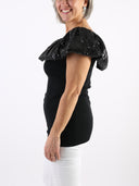 Top con scollo bardot in paillettes