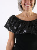 Top con scollo bardot in paillettes
