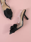 Sandalo slingback nero con tacco e fiore seta