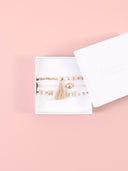 Bracciale a tre giri elastico con cristalli, perline e mini nappa