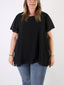 Blusa over con maniche volant e bottoncino dietro