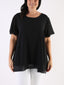 Blusa over con maniche volant e bottoncino dietro