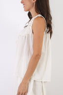 Top in macramé e cotone con volant