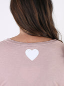 T-shirt con maniche frufru e cuore sulla schiena