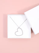 Collana lunga con maxi cuore sagoma intrecciato