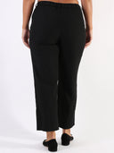 Pantalone baggy con pences e vita asimmetrica