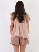 Blusa in macramé e cotone con fiocchetto sulla spalla