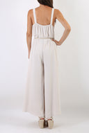 Maxi tuta con spalline larghe con cinturina in pelle abbinata