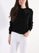 Cardigan con maxi fiori sullo scollo