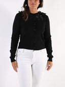 Cardigan con maxi fiori sullo scollo