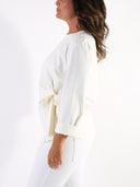 Maglia con fiocco davanti