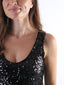 Top con maxi paillettes e spalline larghe