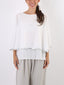 Blusa 2 layers con orlo paillettes