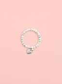 Bracciale elastico con charm cuore e campanellino