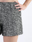 Shorts con mini paillettes