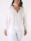Camicetta con pizzo e nappe