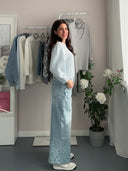 Jeans a palazzo con paillettes azzurre