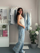 Jeans a palazzo con ricami di perline