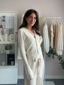 Cardigan crop con bottoni gioiello