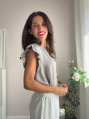 Top greige con maniche frufru