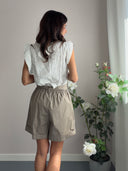 Top in sangallo bianco con maniche frufru
