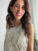 Top piumette e paillettes