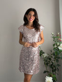 Abito rosa di paillettes