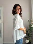 Camicia bianca asimmetrica con zip dietro