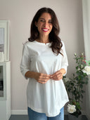 Camicia bianca con fila di bottoncini cuore