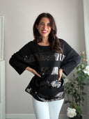 T-shirt nera con paillettes