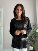 T-shirt nera con paillettes