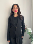 Cardigan elegante con bottone dorato