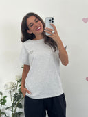 T-shirt con cuoricino strass