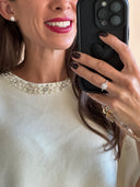 Blusa smanicata con scollo gioiello strass e perle
