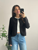 Cardigan con rifiniture intrecciate