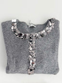 Cardigan con fila di maxi paillettes