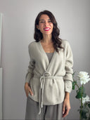 Cardigan beige con laccio e fiocchetto