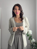 Cardigan beige con laccio e fiocchetto
