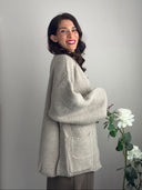 Maxi cardigan aperto lavorato con tasche